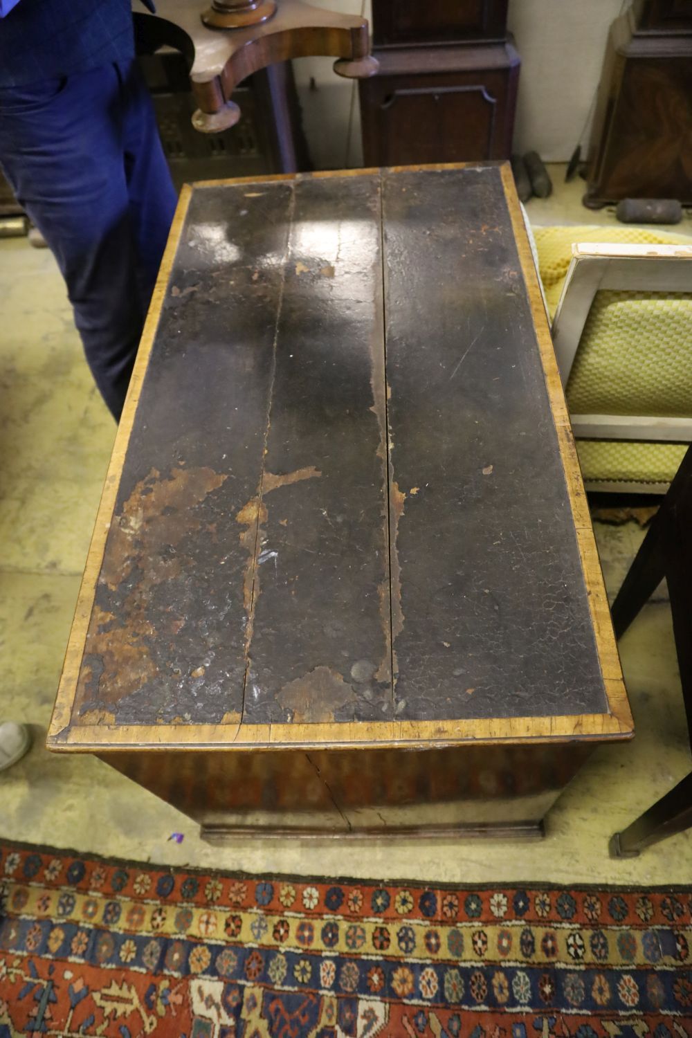 A George IV mahogany kneehole desk, with recessed cupboard, W.115cm, D.60cm, H.76cm